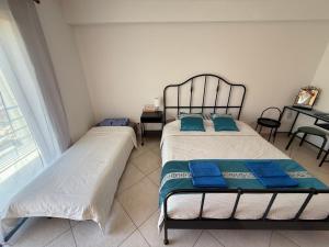 Peniche master bedroom with sea view balcony, private bathroom, shared kitchen, swimming pool, surfing resort