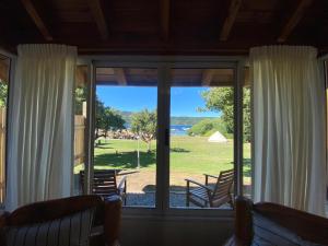 CABAÑAS CON COSTA DE LAGO en CIRSE