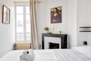 Appartements Ambiance boheme pres de Montmartre : photos des chambres