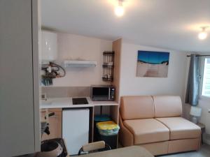 Appart'hotels Trois Studios-Cosy centre village : photos des chambres
