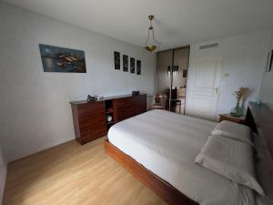 Appartements ღ La Perle Marine - Vue sur le lac avec parking : photos des chambres