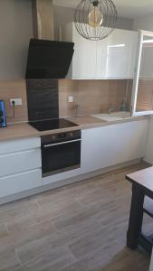 Appartements Maison Le Nova : photos des chambres