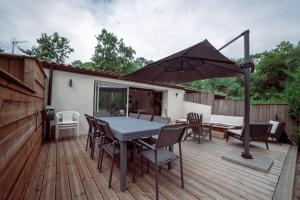 Villas Maison vu Lac en premiere ligne du lac de Lacanau avec terrain de tennis privatif : photos des chambres