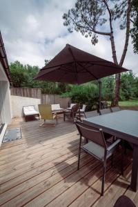 Villas Maison vu Lac en premiere ligne du lac de Lacanau avec terrain de tennis privatif : photos des chambres