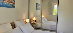 Apartment with garden at the foot of the harbor