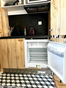 Appartements Cosy studio - Baignoire balneo et Clim : photos des chambres