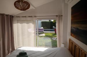 Maisons de vacances Villa Amonite avec Climatisation et Piscine : photos des chambres