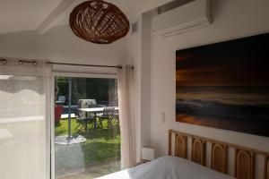 Maisons de vacances Villa Amonite avec Climatisation et Piscine : photos des chambres