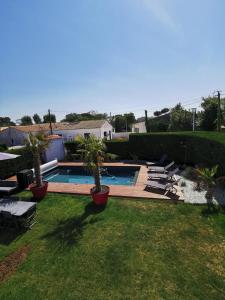 Maisons de vacances Villa Amonite avec Climatisation et Piscine : photos des chambres