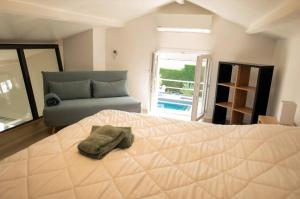 Maisons de vacances Villa Amonite avec Climatisation et Piscine : photos des chambres