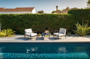 Maisons de vacances Villa Amonite avec Climatisation et Piscine : photos des chambres