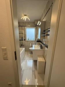 Moderne Erdgeschosswohnung und eigenem Garten für bis zu 4 Personen