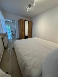 Moderne Erdgeschosswohnung und eigenem Garten für bis zu 4 Personen