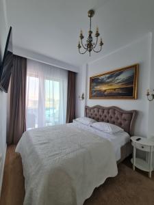 Residence Sole 8 by Wave - Apartament luxury 60mp cu terasa si vedere la mare, acces direct pe plaja OhiOhi Beach- Mamaia Nord - Restaurant, Parcare gratuita
