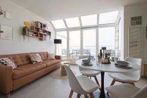 The happy view - penthouse met 2 terrassen op de zeedijk