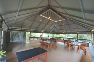 Panchavadi - Forest-Facing Treehouses with a Natural Mountain Pool