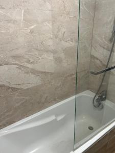 Appartements Grand Appartement 5min disneyland : photos des chambres