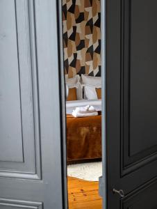 B&B / Chambres d'hotes La Maison d-Arlette - Maison d-Hote et Gite au coeur de l-Isere a 10 mn de Voiron, capitale de la Chartreuse, et du Lac de Paladru : photos des chambres