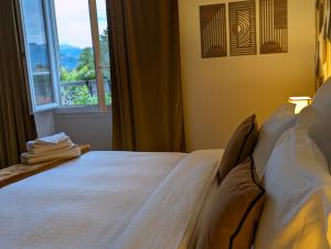 B&B / Chambres d'hotes La Maison d-Arlette - Maison d-Hote et Gite au coeur de l-Isere a 10 mn de Voiron, capitale de la Chartreuse, et du Lac de Paladru : photos des chambres