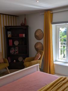 B&B / Chambres d'hotes La Maison d-Arlette - Maison d-Hote et Gite au coeur de l-Isere a 10 mn de Voiron, capitale de la Chartreuse, et du Lac de Paladru : photos des chambres