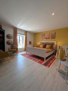 B&B / Chambres d'hotes La Maison d-Arlette - Maison d-Hote et Gite au coeur de l-Isere a 10 mn de Voiron, capitale de la Chartreuse, et du Lac de Paladru : photos des chambres