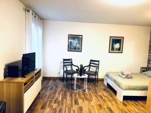 Appartements Le Serenity les pieds dans l-herbe : photos des chambres