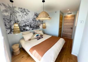 La Maison Cavet 5 Appartements de standing au coeur du village : photos des chambres