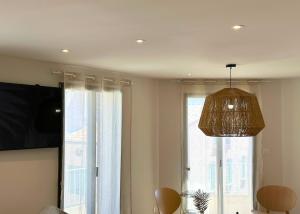 La Maison Cavet 5 Appartements de standing au coeur du village : photos des chambres