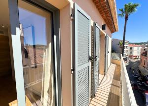 La Maison Cavet 5 Appartements de standing au coeur du village : photos des chambres