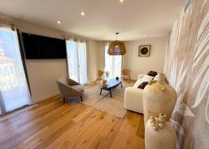 La Maison Cavet 5 Appartements de standing au coeur du village : photos des chambres