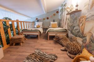 Appartements Triplex Jungle Family : photos des chambres
