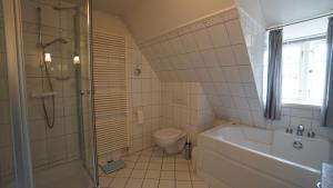 Ferien unterm Reetdach Whg 01