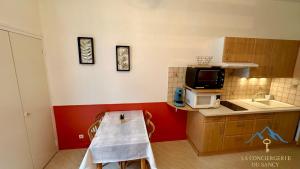 Appartements Les Ambassadeurs 106 La Bourboule : photos des chambres