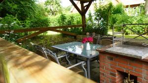 Ferien unterm Reetdach Whg 03