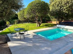 Villas Superbe maison avec piscine : photos des chambres