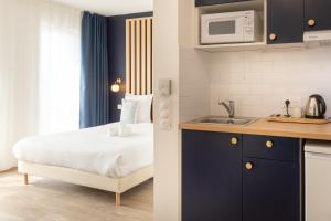 Appart'hotels The Originals Residence Le Monde Paris Ivry Confluence : photos des chambres