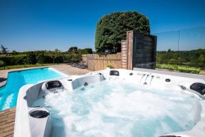 Maisons de vacances L'ecrin de la Cite, Coeur de Vignes - Vivez une experience inoubliable ! : photos des chambres