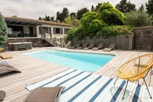 Maisons de vacances L'ecrin de la Cite, Coeur de Vignes - Vivez une experience inoubliable ! : photos des chambres