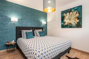 Maisons de vacances L'ecrin de la Cite, Coeur de Vignes - Vivez une experience inoubliable ! : photos des chambres