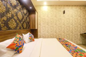 FabHotel Joy Residency