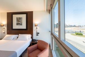 Double Room with Side Sea View room in Abba Playa Gijón