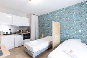 Appartements Appart-Hotel Tournusien : photos des chambres