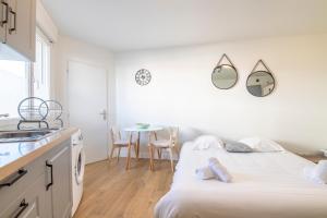 Appartements Studio du Barbier, plein centre : photos des chambres