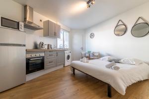 Appartements Studio du Barbier, plein centre : photos des chambres