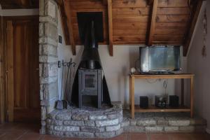 Cabaña costa de lago en complejo de cabañas