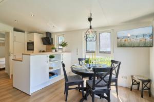 Ostseecamp Ferienhaus "Windstill"