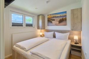 Ostseecamp Ferienhaus "Windstill"