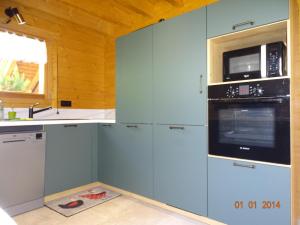 Chalets Le Chalet au vieux vignoble avec espace Sauna et Jacuzzi : photos des chambres