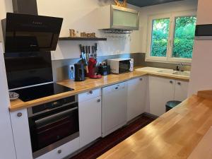 Maisons de vacances Le Cosy, maison de ville, avec jolie terrasse : photos des chambres