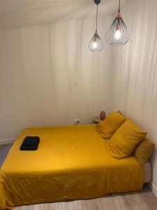 Maisons de vacances Le Cosy, maison de ville, avec jolie terrasse : photos des chambres